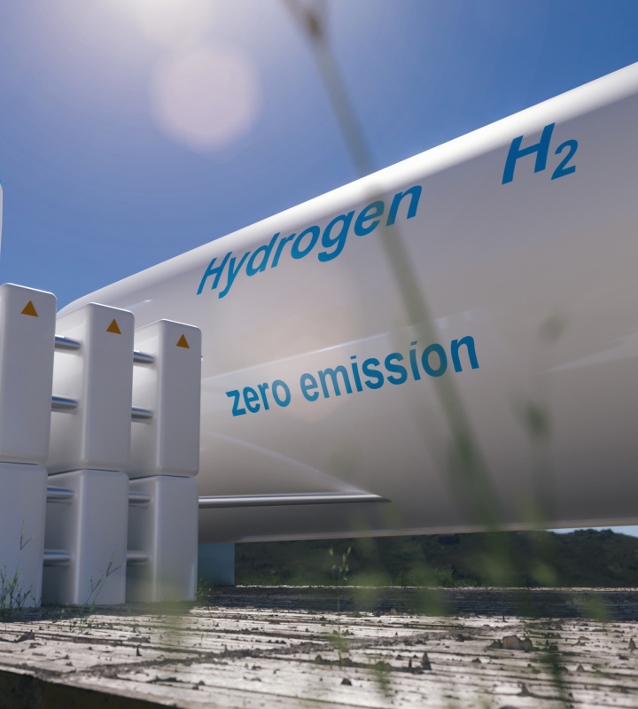 Réservoir d'hydrogène portant les inscriptions "Hydrogen" et "zero emission" dans un environnement ensoleillé, symbolisant une énergie propre et durable. Cette installation illustre le potentiel de l'hydrogène comme solution énergétique respectueuse de l'environnement, un domaine dans lequel Groupe E pourrait jouer un rôle.